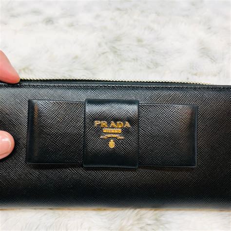 prada zip wallet with bow|Prada zippy wallet.